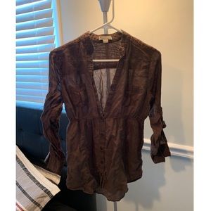 Brown half way button up shirt